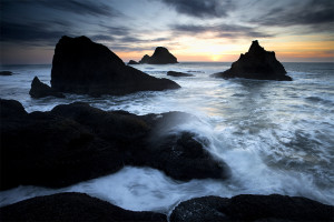 Sea stacks near Oceanside, Oregon stand as protectors from the wildness of the open ocean